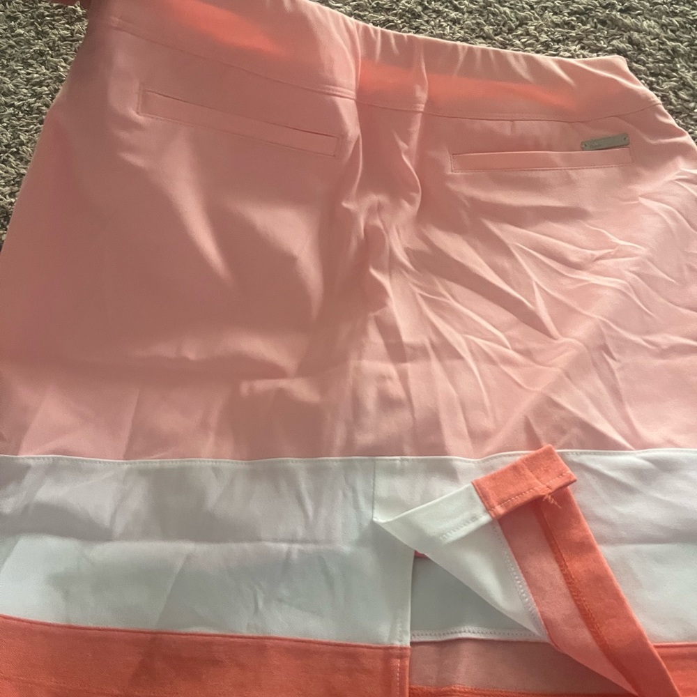 Darling Adidas pull on skirt— size small, tags still on! Original price $75!